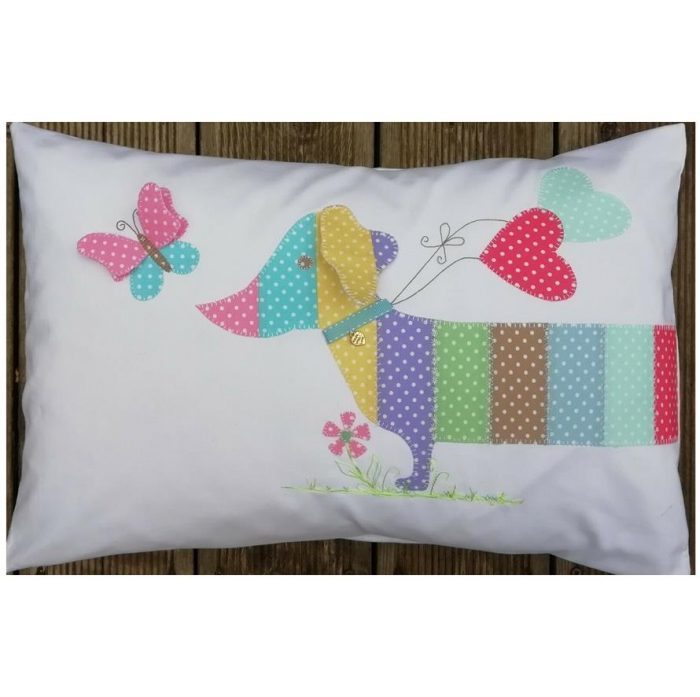 A delightful appliqued sausage dog that can be a cushion or a bag. by Gail Penberthy