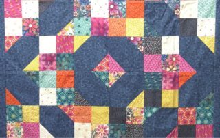 Four patch and big square quilt