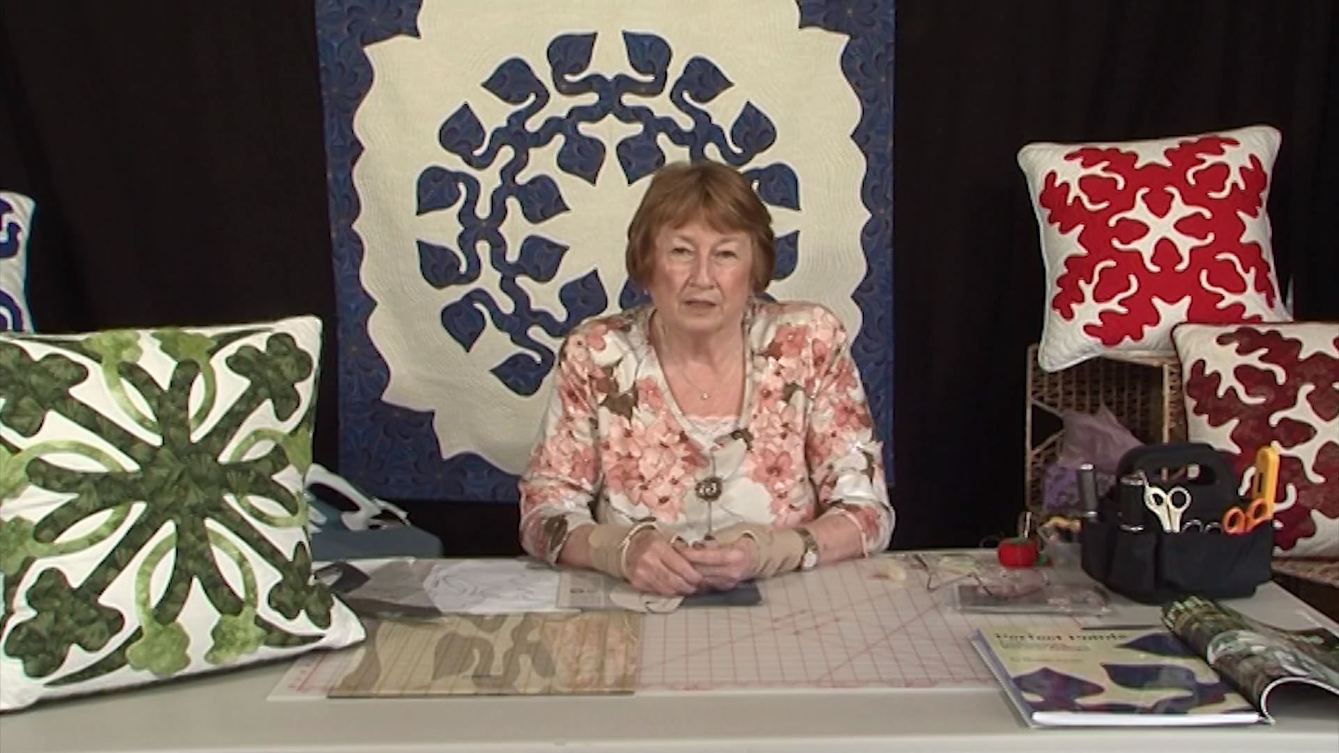 Maggie Davies with hawaiian quilts