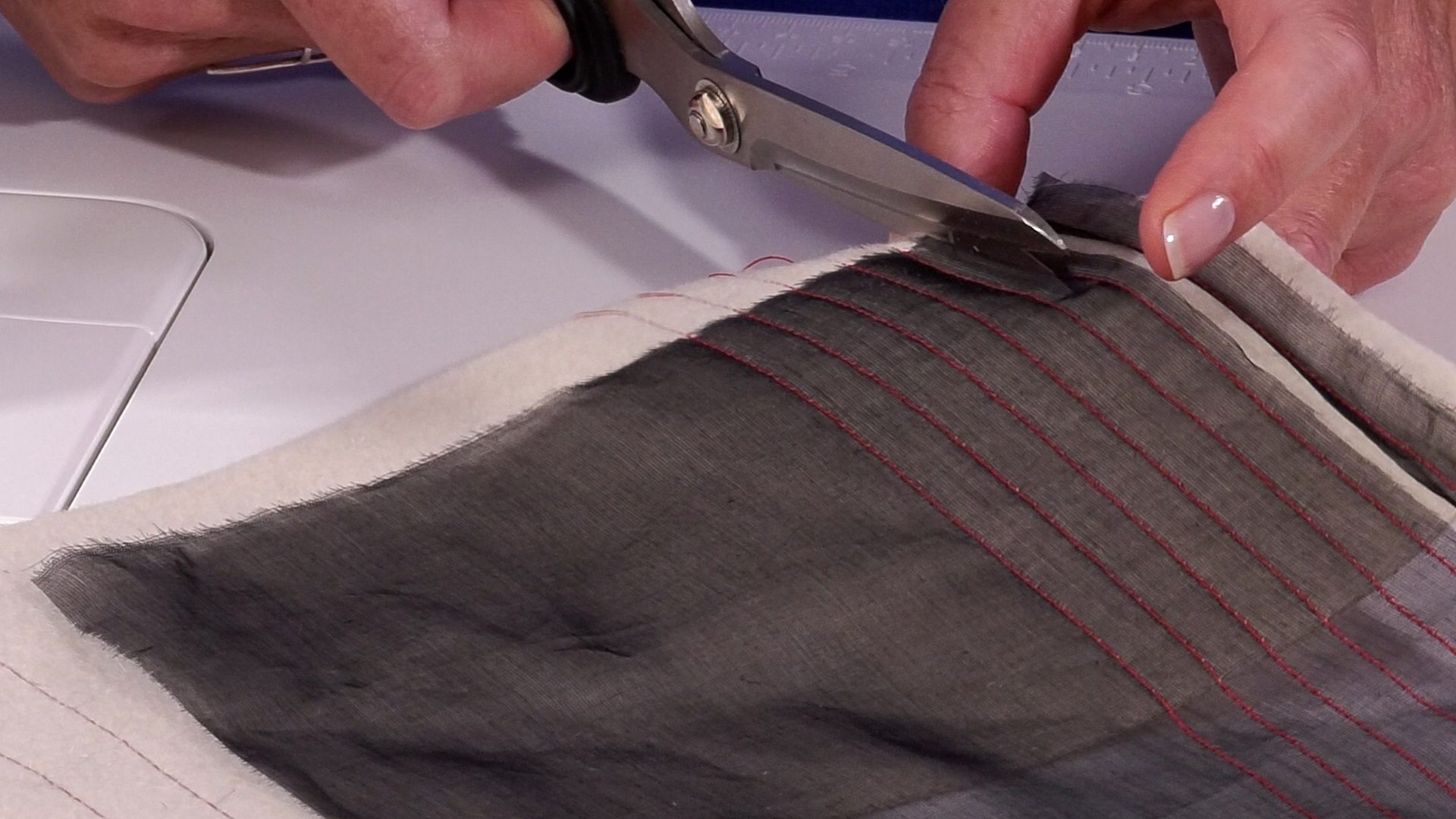 Cutting fabric with scissors