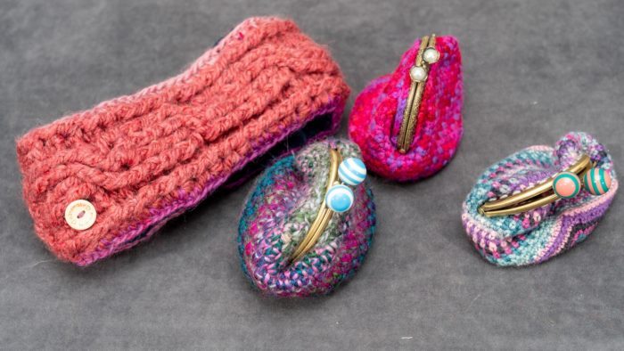 variety of crochet purses and headband